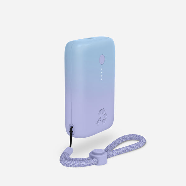 A compact portable charger in a gradient of blue to purple with a lanyard loop, displaying the brand logo.