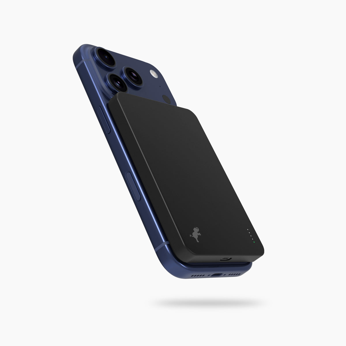 Blue iphone with a black nimble magnetic phone charger on the back, magsafe phone charger magnetic battery pack.