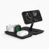 A black Fold 3-in-1 wireless charger with dedicated charging zones for an iPhone, Apple Watch, and AirPods, displayed in a stand-by mode.